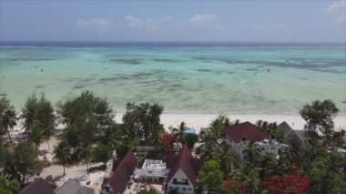 This stock video shows boats in the ocean off the coast of Zanzibar in 8K resolution