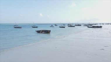 This stock video shows boats in the ocean off the coast of Zanzibar in 8K resolution