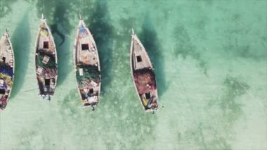 This stock video shows boats in the ocean off the coast of Zanzibar in 8K resolution