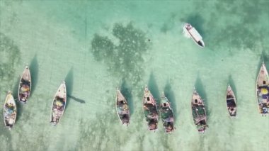 This stock video shows boats in the ocean off the coast of Zanzibar in 8K resolution