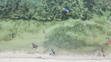 This stock video shows boats in the ocean off the coast of Zanzibar in 8K resolution