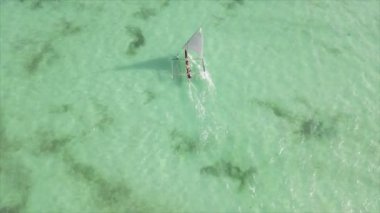 This stock video shows boats in the ocean off the coast of Zanzibar in 8K resolution