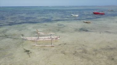 This stock video shows boats in the ocean off the coast of Zanzibar in 8K resolution