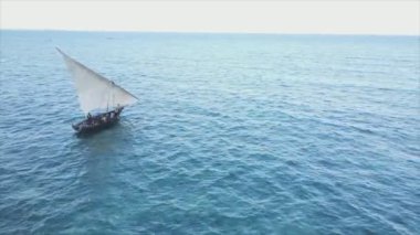 This stock video shows boats in the ocean off the coast of Zanzibar in 8K resolution