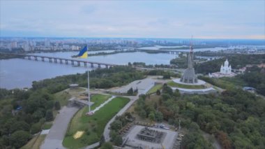 This stock footage shows aerial view of the national flag of Ukraine in Kyiv in 8K resolution