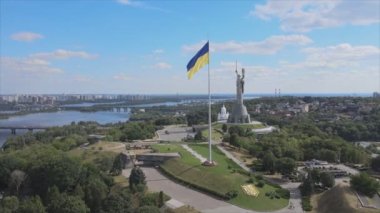 This stock footage shows aerial view of the national flag of Ukraine in Kyiv in 8K resolution