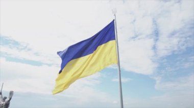 This stock footage shows aerial view of the national flag of Ukraine in Kyiv in 8K resolution