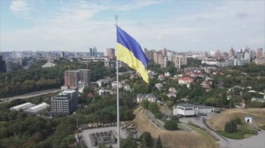 This stock footage shows aerial view of the national flag of Ukraine in Kyiv in 8K resolution