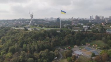This stock footage shows aerial view of the national flag of Ukraine in Kyiv in 8K resolution