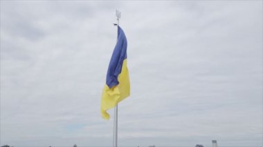 This stock footage shows aerial view of the national flag of Ukraine in Kyiv in 8K resolution