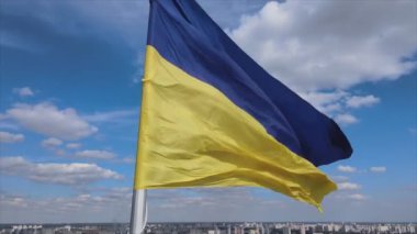 This stock footage shows aerial view of the national flag of Ukraine in Kyiv in 8K resolution