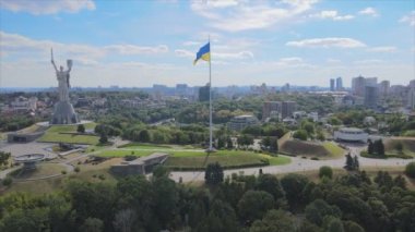 This stock footage shows aerial view of the national flag of Ukraine in Kyiv in 8K resolution