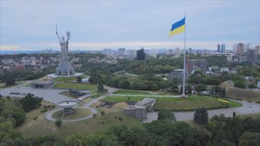 This stock footage shows aerial view of the national flag of Ukraine in Kyiv in 8K resolution