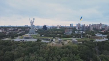 This stock footage shows aerial view of the national flag of Ukraine in Kyiv in 8K resolution
