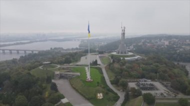 This stock footage shows aerial view of the national flag of Ukraine in Kyiv in 8K resolution