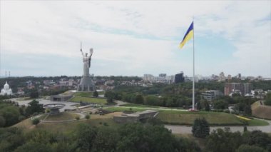 This stock footage shows aerial view of the national flag of Ukraine in Kyiv in 8K resolution