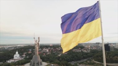 This stock footage shows aerial view of the national flag of Ukraine in Kyiv in 8K resolution