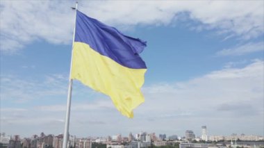 This stock footage shows aerial view of the national flag of Ukraine in Kyiv in 8K resolution