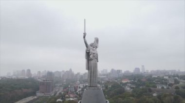 This stock video shows an aerial view of the symbol of Kyiv, Ukraine - the Motherland Monument in 8K resolution