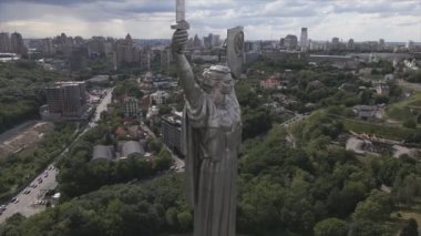 This stock video shows an aerial view of the symbol of Kyiv, Ukraine - the Motherland Monument in 8K resolution