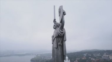 This stock video shows an aerial view of the symbol of Kyiv, Ukraine - the Motherland Monument in 8K resolution