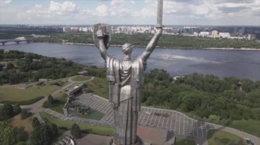 This stock video shows an aerial view of the symbol of Kyiv, Ukraine - the Motherland Monument in 8K resolution
