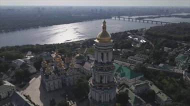 This stock video shows an aerial view of the historical symbol of Kyiv, Ukraine - Kyiv Pechersk Lavra in 8K resolution