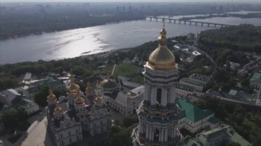 This stock video shows an aerial view of the historical symbol of Kyiv, Ukraine - Kyiv Pechersk Lavra in 8K resolution