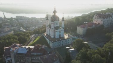 This stock video shows an aerial view of St. Andrews Church in Kyiv, Ukraine in 8K resolution