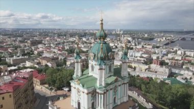 This stock video shows an aerial view of St. Andrews Church in Kyiv, Ukraine in 8K resolution