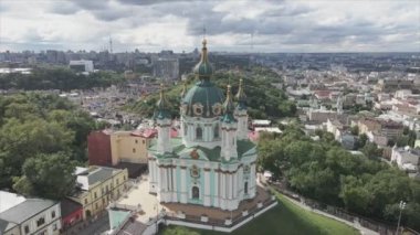 This stock video shows an aerial view of St. Andrews Church in Kyiv, Ukraine in 8K resolution