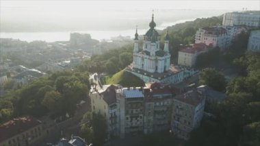 This stock video shows an aerial view of St. Andrews Church in Kyiv, Ukraine in 8K resolution