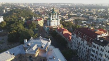 This stock video shows an aerial view of St. Andrews Church in Kyiv, Ukraine in 8K resolution