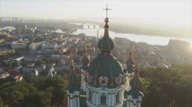 This stock video shows an aerial view of St. Andrews Church in Kyiv, Ukraine in 8K resolution