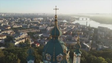 This stock video shows an aerial view of St. Andrews Church in Kyiv, Ukraine in 8K resolution