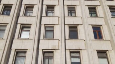 This stock footage shows aerial view of a building built in the style of the former USSR in 8K resolution