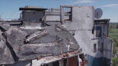 This stock video shows a destroyed residential building during the war in Ukraine in Borodyanka, Bucha district in 8K resolution