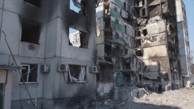This stock video shows a destroyed residential building during the war in Ukraine in Borodyanka, Bucha district in 8K resolution