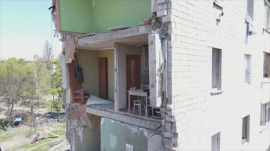 This stock video shows a destroyed residential building during the war in Ukraine in Borodyanka, Bucha district in 8K resolution