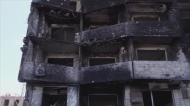 This stock video shows a destroyed residential building during the war in Ukraine in Borodyanka, Bucha district in 8K resolution