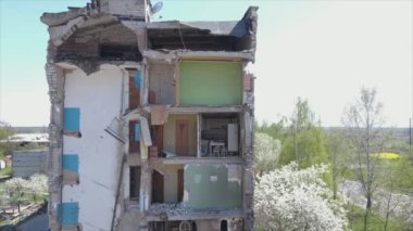 This stock video shows a destroyed residential building during the war in Ukraine in Borodyanka, Bucha district in 8K resolution