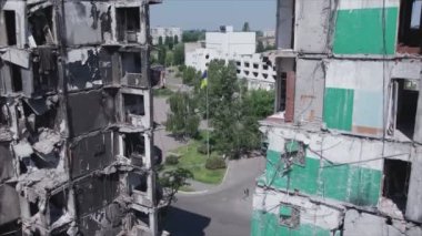 This stock video shows a destroyed residential building during the war in Ukraine in Borodyanka, Bucha district in 8K resolution