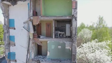 This stock video shows a destroyed residential building during the war in Ukraine in Borodyanka, Bucha district in 8K resolution