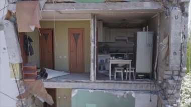 This stock video shows a destroyed residential building during the war in Ukraine in Borodyanka, Bucha district in 8K resolution