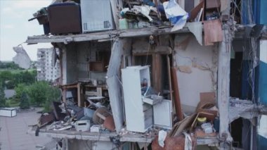 This stock video shows a destroyed residential building during the war in Ukraine in Borodyanka, Bucha district in 8K resolution