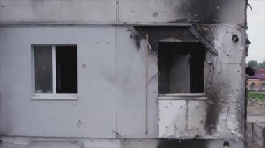 This stock video shows a destroyed residential building during the war in Ukraine in Borodyanka, Bucha district in 8K resolution