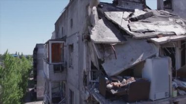 This stock video shows a destroyed residential building during the war in Ukraine in Borodyanka, Bucha district in 8K resolution