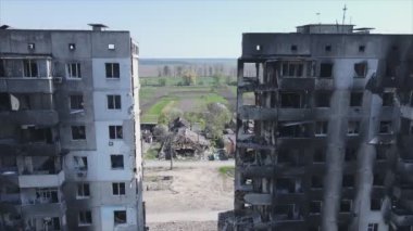 This stock video shows a destroyed residential building during the war in Ukraine in Borodyanka, Bucha district in 8K resolution