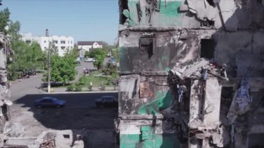 This stock video shows a destroyed residential building during the war in Ukraine in Borodyanka, Bucha district in 8K resolution