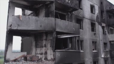 This stock video shows a destroyed residential building during the war in Ukraine in Borodyanka, Bucha district in 8K resolution